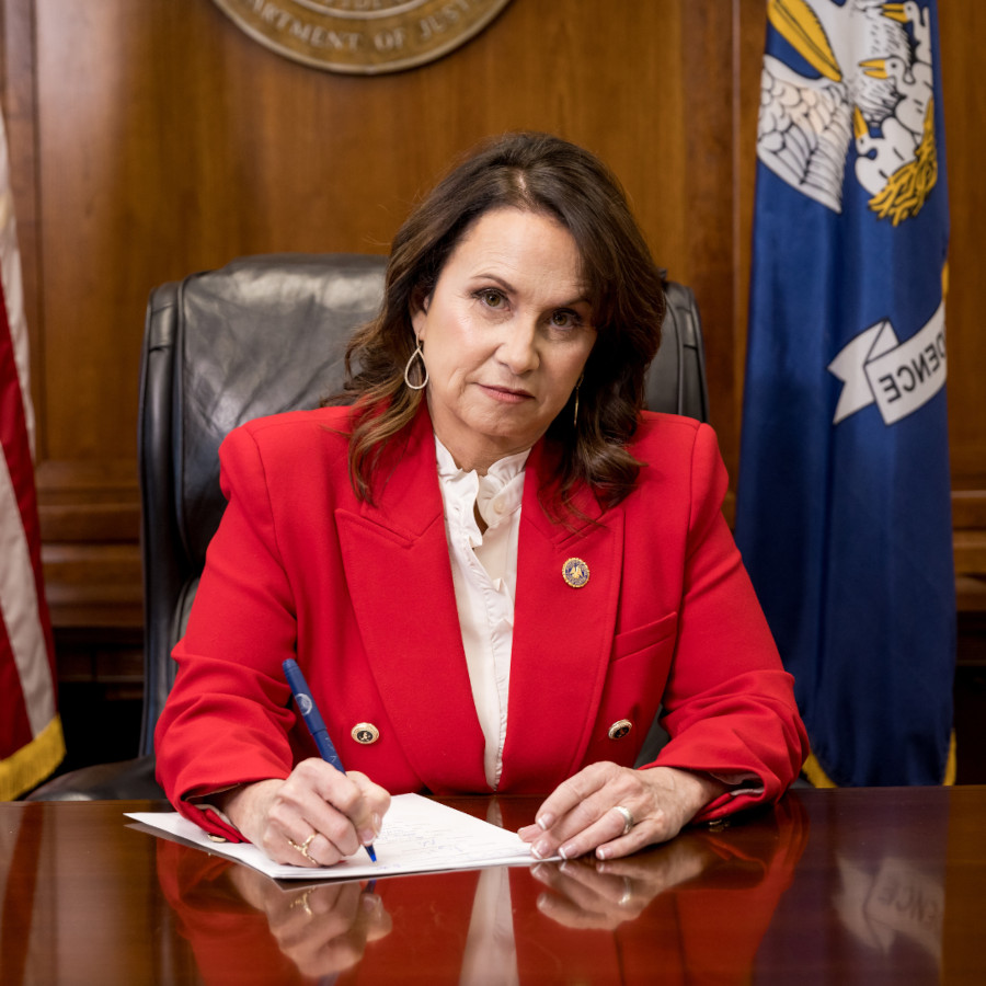 Liz Murrill at Desk